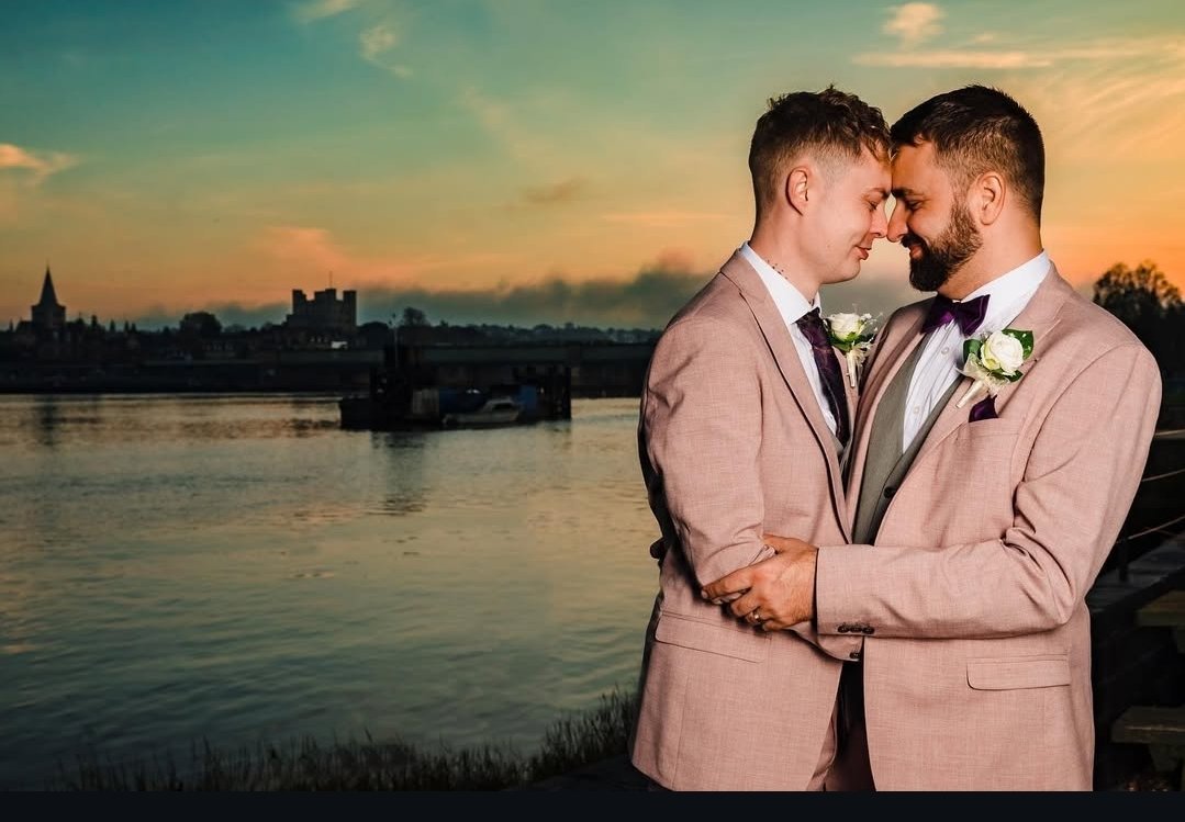 Couple sharing an intimate moment at sunset